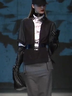 Texting & Walking: When Models Check Their Phones On The Runway