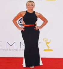 Whew! Nurse Jackie brought it in black-and-white, gilt-belted Stella McCartney. Seriously, we've never seen Edie Falco look so ravishing. It was sleek, fresh, and totally unexpected — exactly what joyously keeps us on our red-carpet tippy toes. Photo: Matt Baron/BEImages emmys-dresses-edie-falco