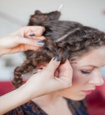 Step 4: When you get to the ear, stop French braiding and braid the rest of the hair normally. Secure with elastic and pull braid apart a bit to loosen. 32_18_style2_step7