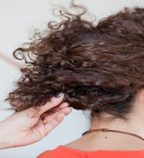Step 10: Secure with hairpins beneath the French twist. 11_10_style1_step9