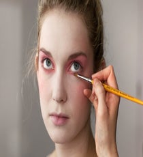 Apply the pink shadow in a soft line beneath the lash line, connecting it to the color on top at the outer corner of the eye. 08_HalloweenLook1_091512_169