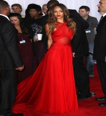 Rihanna
Like Cher Horowitz before her, Rihanna rocked the red carpet in a custom Alaïa gown. She was one of two best-dressed ladies to surprise us with an unexpected rouge choice (the other was Adele). Yet, the real treat was seeing the Bajan singer in the most mature, glamorous attire we've seen on her in quite some time, proving that while she is the queen of on-the-street style, she can also stun in an airy floor-skimmer, too. No one will be saying, "It's an a-what-a?" to RiRi.
Photo: Jim Smeal/BEImages
Rihanna - Grammys 2013