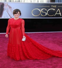 Sally Field
Though it's a little unusual to see fall '12 couture on a 2013 red carpet, leave it to Sally Field to throw silly rules to the wind in favor of an undeniably gorgeous and flattering Valentino stunner. The incredible gowns from that collection didn't get nearly enough play, if you ask us, and so we absolutely don't fault Field for her pick. While long sleeves can often feel boring and stereotypical on older actresses, in this case, the opposite is true: She looks sexy but refined, fashion-forward, and iconically chic.
Photo: Jim Smeal/BEImages
Sally Field 2013 Oscars