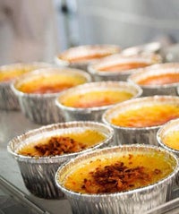Say "Bonjour" To The Crème Brûlée Cart's First Brick And Mortar! creme opener
