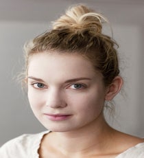 "Effie's look reflects her eccentric, luxurious style," says Evans. "We started with the skin to capture the nuances of the look." Here, she mixed a white pigment with a light foundation to create a pale flesh tone on Tara's exposed skin — face, neck, and ears. She then set the foundation with a matte, translucent loose powder. 03_HalloweenLook1_091512_018