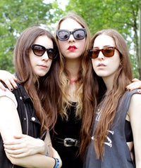 The Youngest HAIM Sister Talks Fake IDs & Stalking Tom Petty haim-op