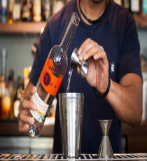 Step 1: Measure and pour the Hangar Mandarin and orgeat into a shaker. 003_SpicyCocktails_1st