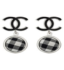 The classic interlocking Cs go retro with summery gingham.
Chanel Double C gingham earrings, available in Chanel stores.
Chanel-3