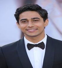 Best: Suraj Sharma
This kid is unbelievably handsome...though you might not have noticed it when he was emaciated and unshowered in Life of Pi. A lot of guys try to find a middle ground between super-slicked, volume-free hair and a tamer version of their natural, longer waves, and this is an example of how that attempt can be very successful. Plus, we like his eyebrows. And his smile. And everything else about him.
Photo: Jim Smeal/BEI Images rexusa_1255652k