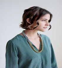 Curl each section of hair until all of that top layer of your hair is curled.
Joie Marlo D Top, Noise Girl Lyle Necklace quick-beauty-3
