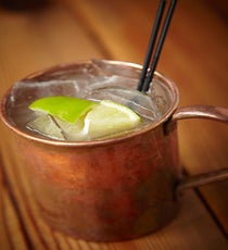 The Bristol: Dark & Stormy
1.5 oz ginger puree
2 oz Goslings Rum
½ oz lime juice
Goslings Ginger Beer
Add ginger puree, lime, and rum to a glass. Add ice to a shaker, and add contents to shaker. Shake 10 to 15 times and pour over four large cubes of ice in a Collins glass. Top with Goslings Ginger Beer. Add fifth large cube of ice to drink and drizzle “black strap” molasses to cocktail — two long straws.
The Bristol, 2152 North Damen Avenue (at Webster Avenue); 773-862-5555
Photo: Courtesy of The Bristol TheBristol-darkandstormy