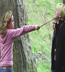 Hermione never resorts to violence — mainly because she always has a better, smarter option up her sleeve. Though Katniss' descent into brutality is forced, the willingness to kill is still a central part of her character, something which Hermione always avoids even when her own life is in danger. She just doesn't want to add more pain to this world. (Except for that one time with Malfoy. But he totally deserved it.)
Photo: Courtesy of Warner Bros.
herminoemalfoy