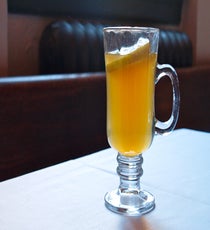 Black Caullin Toddy
This hot toddy may not technically cure your cold symptoms, but it's certainly a delicious course of treatment. It's juicy and bright with just a bit of spice and smoke (and, yes —even the Scotch-phobes out there will enjoy it). 12_hottoddy