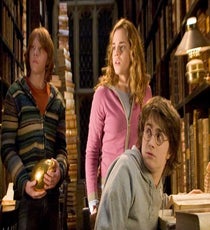 Because Katniss is a loner. Ms. Everdeen thinks she needs nothing and no one, but that works to her disadvantage. Hermione, on the other hand, knows her friends are her greatest strength. She's part of a trifecta that's much stronger united than divided.
Photo: Courtesy of Warner Bros.
hermione1