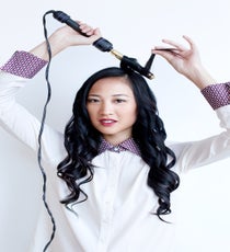 As you move around the head, keep curling your hair in the same direction that you started with. This means that by the time you get to the opposite side of your head, you will be directing the curl away from the face, instead of toward it. This is what guarantees that consistency that separates the beachy wave from the sleek wave. sleek-waves-3