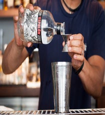 Step 3: Pour in the tequila blanco and combier. 035_SpicyCocktails_3rd