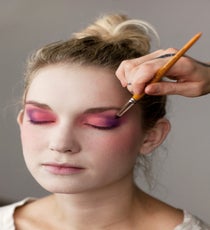 Using a plum shadow, apply the color to the outer corner of the eye, blending towards the middle of the eyelid. Evans says that pink and purple shadows should blend together flawlessly — there should be no harsh, defined lines. 09_HalloweenLook1_091512_231