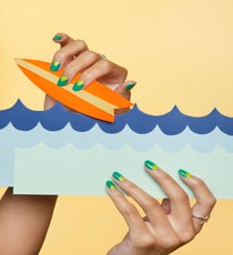 Tri-Hard
We love the graphic effect a two-tone mani in complementary colors creates, but we're kinda over the usual half moon and French tip iterations. Handa brought out the best in these green hues by creating sharp lines with a triangle insert at the nail bed.
"Sharp angles add surprise value to where you would normally expect to see rounded edges," says Handa. "It's a nice way to deviate from the norm and add interest where you least expect it."
Vera Meat Spine Ring, $88, available at Vera Meat; Vera Meat Starfish Ring, $128, available at Vera Meat. 03_Nailapalooza_060713_264_3_R
