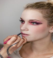 Evans then applied Make Up For Ever Aqua Lip Waterproof Lipliner in hot pink #16C. First she lined the lips, then connected the top and bottom lips, filling in the rest of Tara's mouth with a bright pink lipstick. 14_HalloweenLook1_091512_462