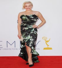 Elisabeth Moss was the biggest goosebump-giver of the eve in her strapless floral Dolce & Gabbana dress and H. Stern jewels. Talk about coming out of one's shell, girlfriend went platinum on so many levels! We bet many a role far above Peggy (or TV, for that matter) surfaces from her night out on Tinseltown in that bombshell situation! Photo: Matt Baron/BEImages emmys-dresses-elisabeth-moss