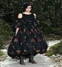 Helena Bonham Carter's wacky-goth aesthetic is perfectly matched to this Chanel look. Plus, the shorter hemline would ensure that any footwear antics she pulls would be properly showcased. cha_HCss13_164