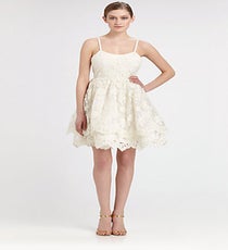 Alice and Olivia Floral Lace Puff Dress, $597, available at Saks Fifth Avenue. Alice-and-Olivia-Floral-Lace-Puff-Dress_Saks_597