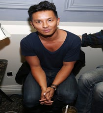 Prabal watches Lana in his now signature v-neck.Photos: Courtesy of H&M 152468759_AS_3845_36AA5B439A99E666391D5A52F09A6A0B